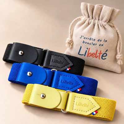 Trois ceintures enfant Libelté noire, bleu électrique et jaune, présentées avec leur pochon réutilisable.