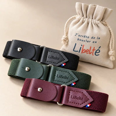 Trois ceintures enfant Libelté noire, olive et bordeaux, présentées avec leur pochon en lin.